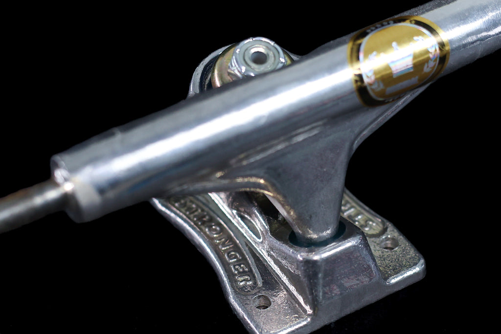 STRONGER TRUCKS POLISHED HOLLOW AXLE + FREE CAP